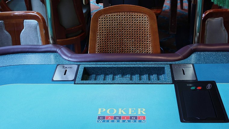 Poker room table with chip trays