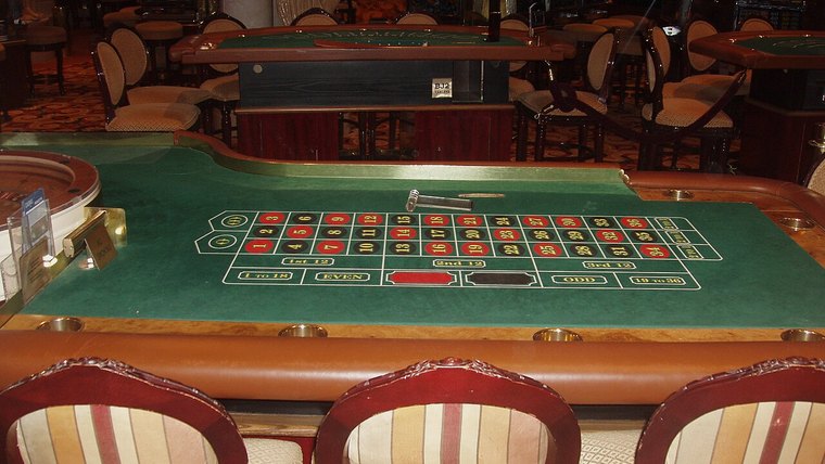 Roulette table with betting layout