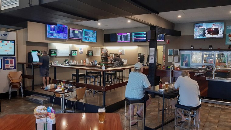 Bar with screens showing sport and gaming
